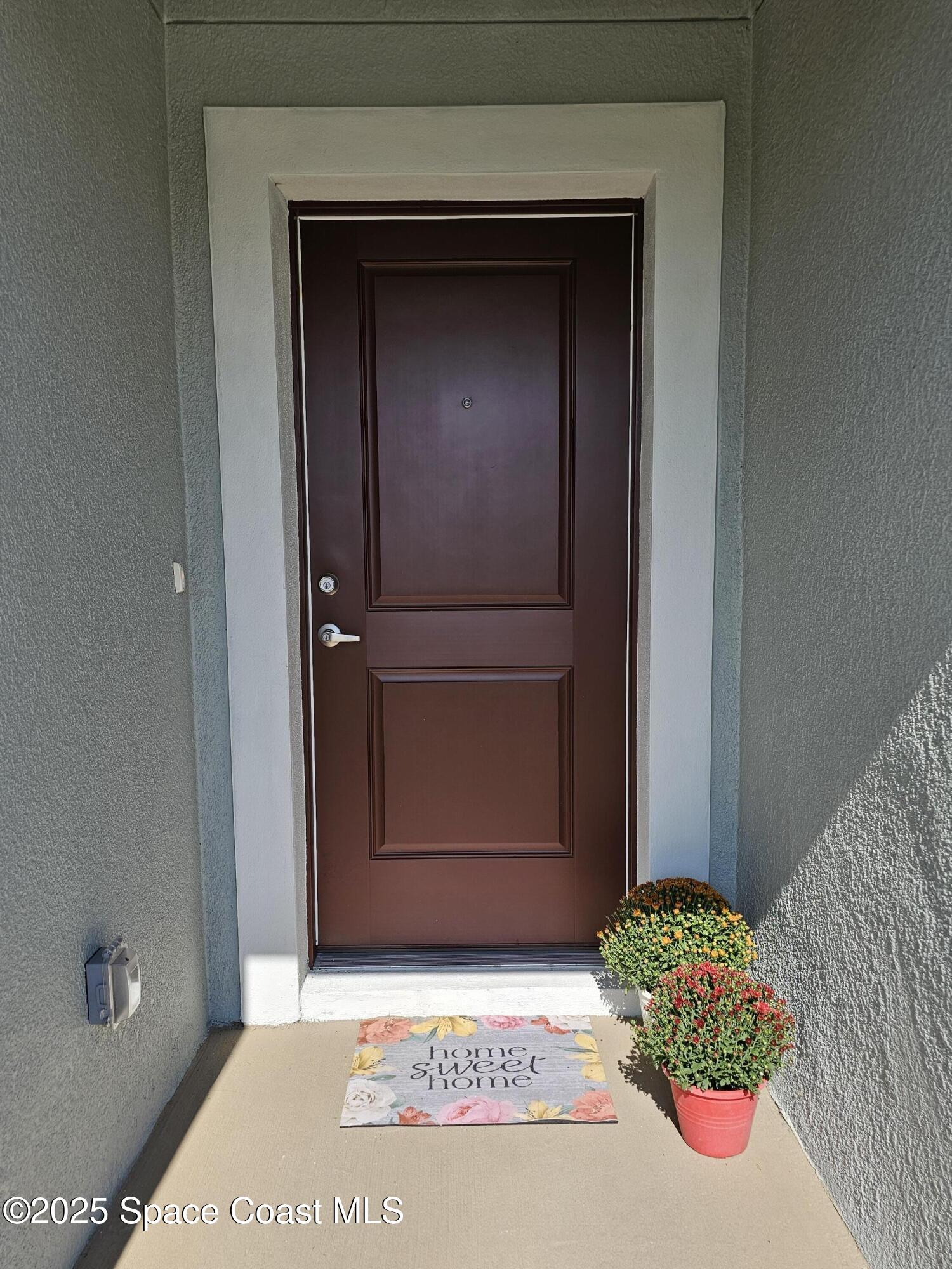 1211 Tupelo Circle Cocoa, FL 32926 - Photo 2 of 15 a view of front door