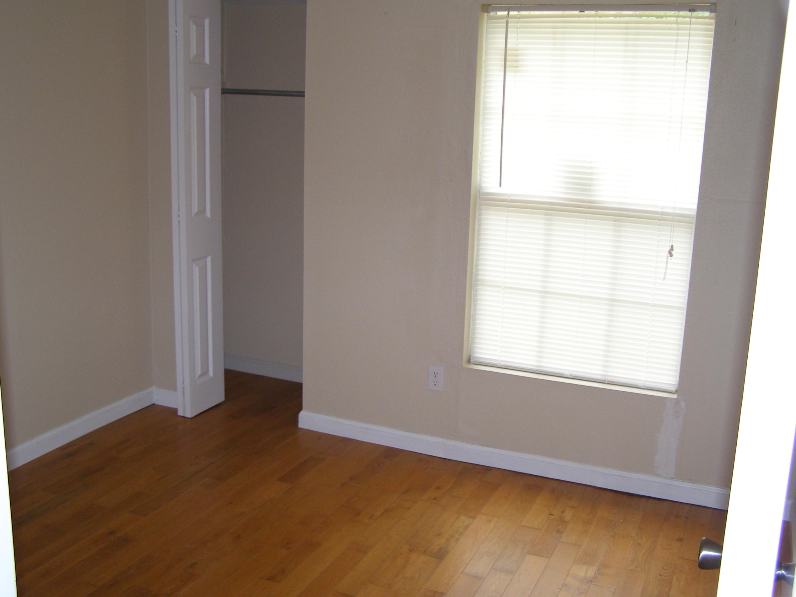 84 Roberts Road East DeFuniak Springs, FL 32433 - Photo 13 of 18 an empty room with a window