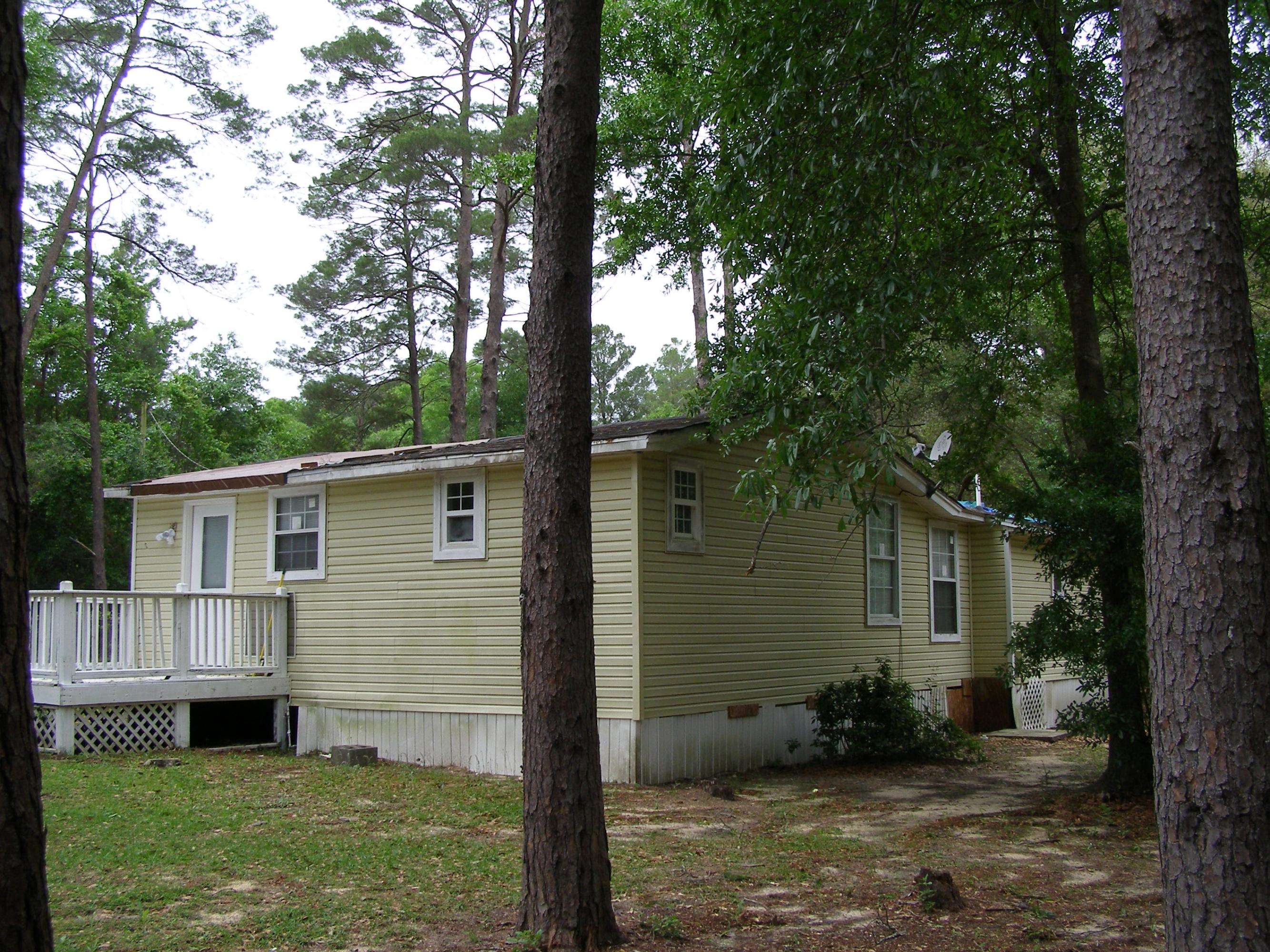 84 Roberts Road East DeFuniak Springs, FL 32433 - Photo 4 of 18 a view of backyard of the house