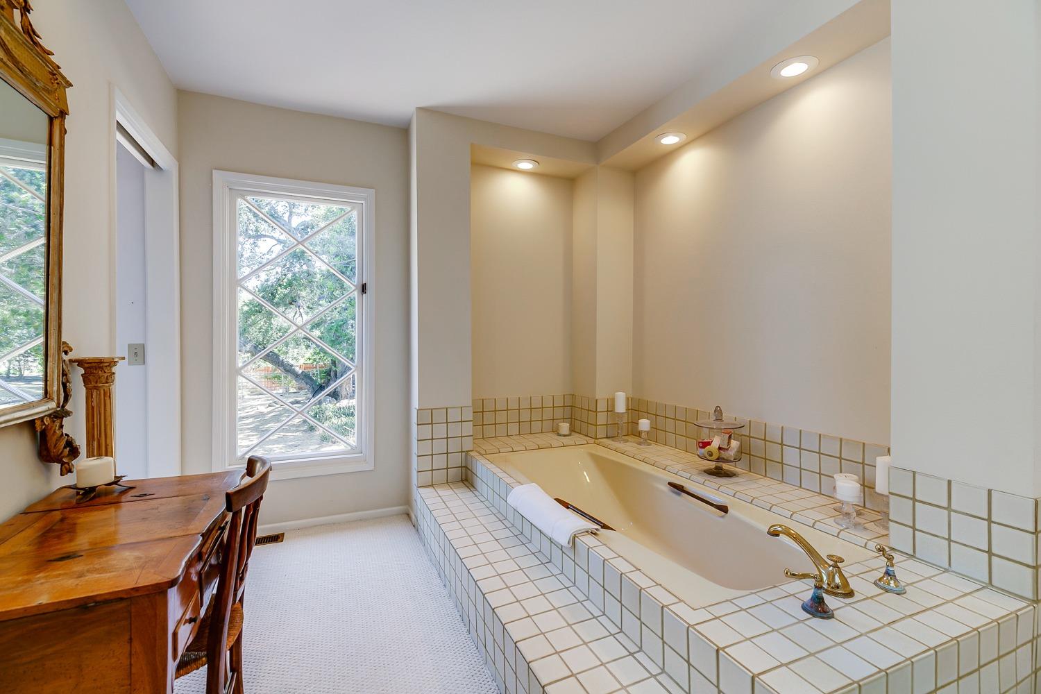 616 Palomar Road Ojai, CA 93023 - Photo 25 of 48 a large spacious bathroom with a large tub and sink