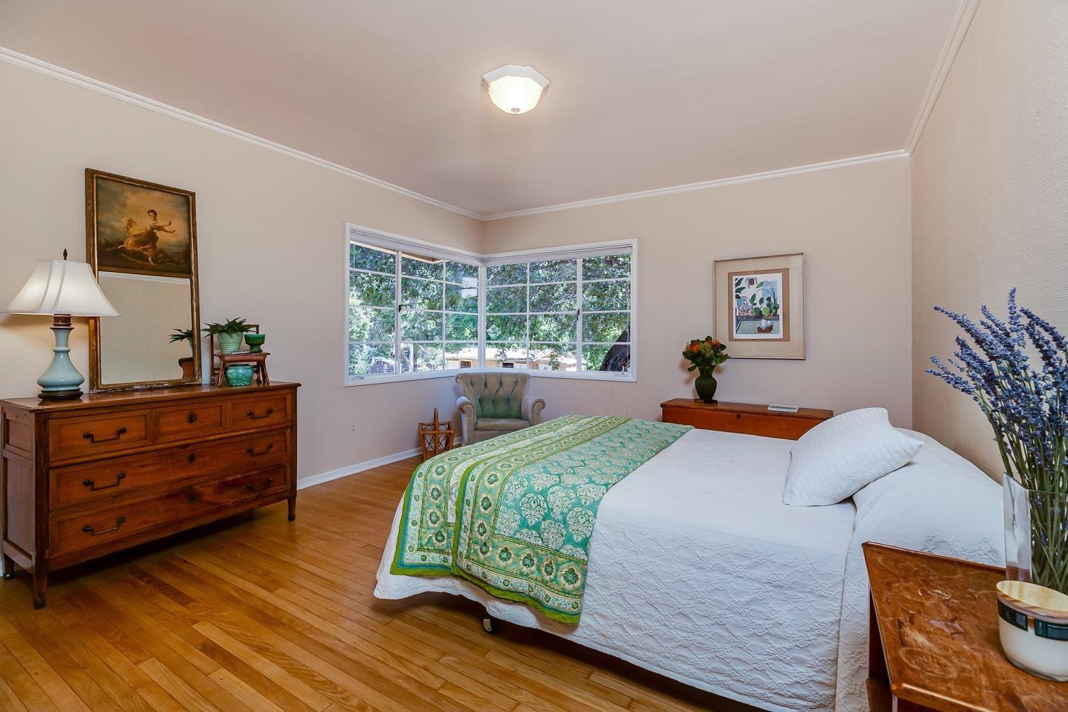 616 Palomar Road Ojai, CA 93023 - Photo 31 of 48 a bedroom with a bed and window