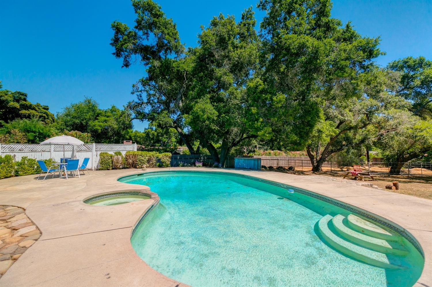 616 Palomar Road Ojai, CA 93023 - Photo 39 of 48 a view of a house with pool and trees in the background