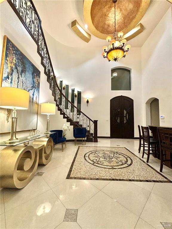 336 Navarro Street Pharr, TX 78577 - Photo 20 of 32 Building lobby with a high ceiling and stairs