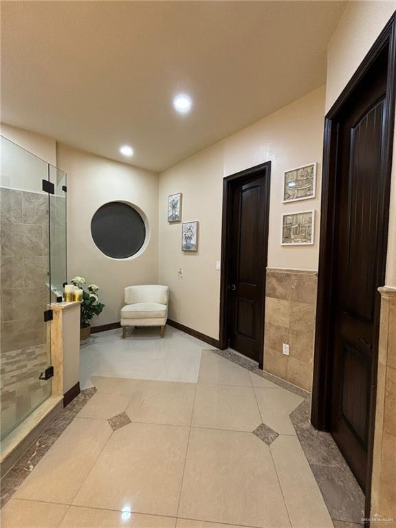 336 Navarro Street Pharr, TX 78577 - Photo 25 of 32 Full bathroom with a shower stall, recessed lighting, and tile patterned floors