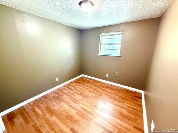a view of a room with a window