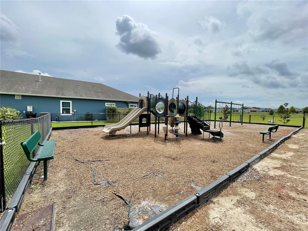 1021 Southwest 67th Street Gainesville, FL 32607 - Photo 51 of 53 a view of a park with swings