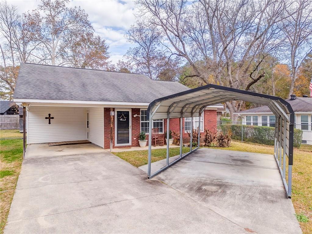 1A Green Acre Road Northeast Rome, GA 30165 - Photo 2 of 29 a view of swimming pool with a patio and a yard