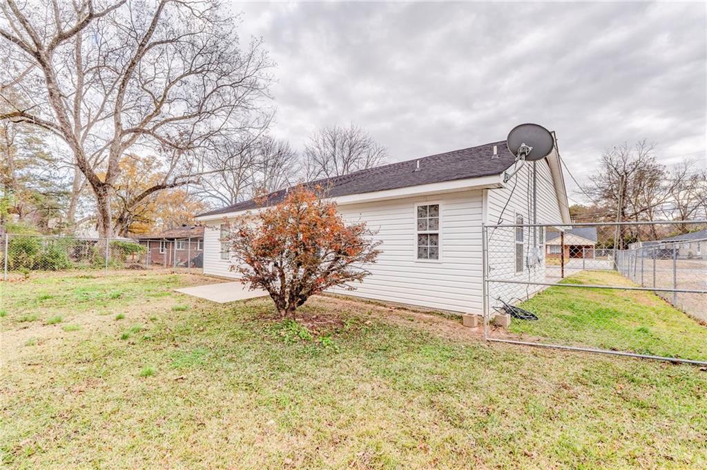1A Green Acre Road Northeast Rome, GA 30165 - Photo 24 of 29 a view of a yard with snow on the road