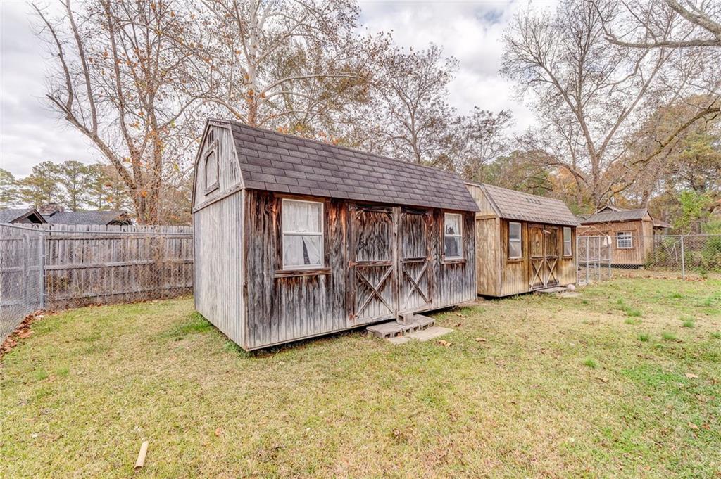 1A Green Acre Road Northeast Rome, GA 30165 - Photo 25 of 29 a view of a house with a big yard and large tree