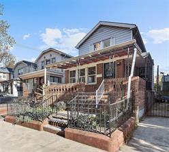 a front view of a house with parking