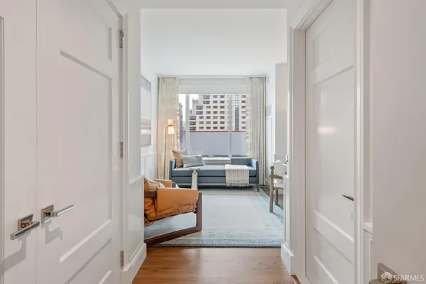 a spacious bedroom with a bed and a couch