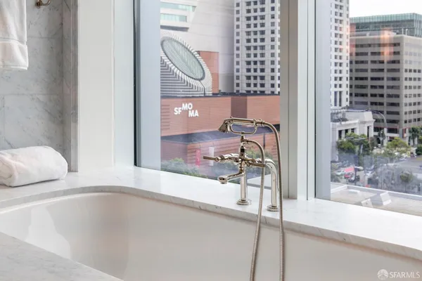 a bathroom with a sink and a shower