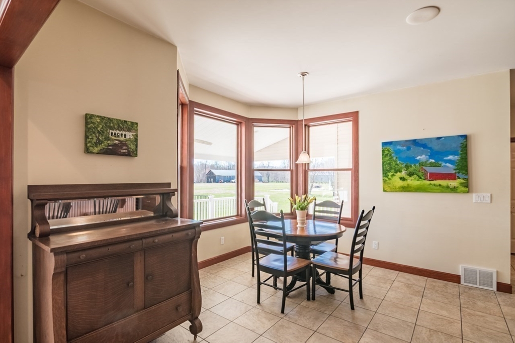65 Bridge Street Hatfield, MA 01038 - Photo 11 of 40 a view of a dining room with furniture window and outside view