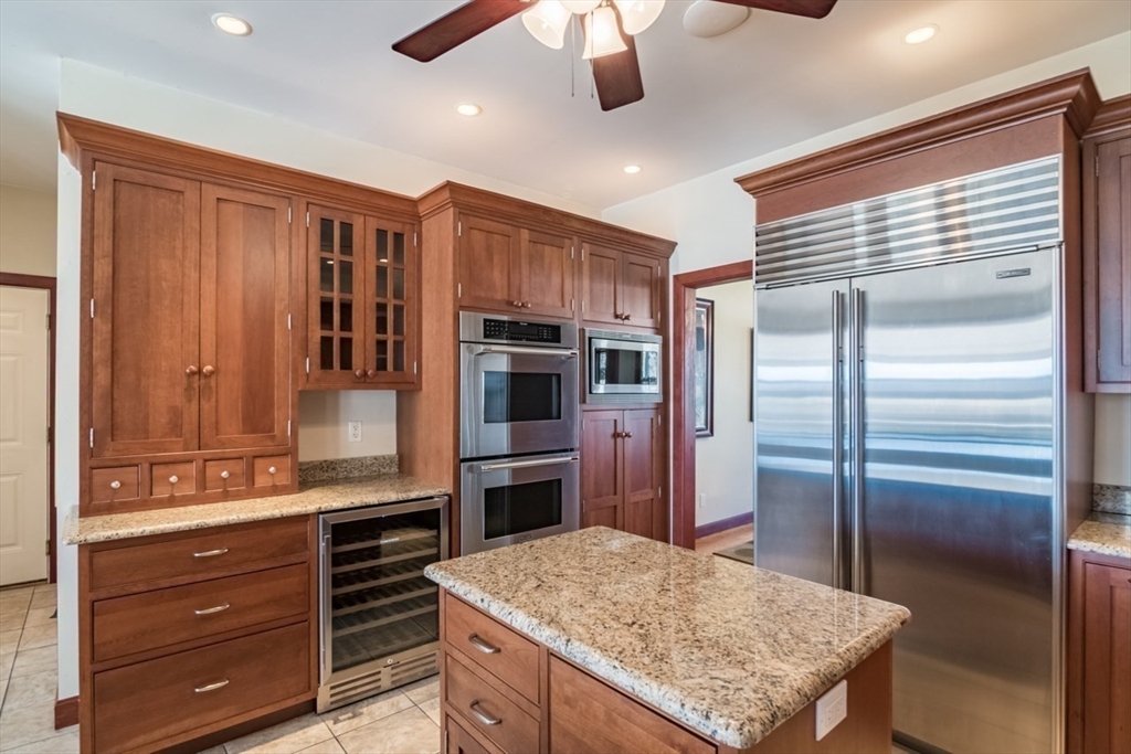 65 Bridge Street Hatfield, MA 01038 - Photo 13 of 40 a kitchen with stainless steel appliances granite countertop a refrigerator and a sink