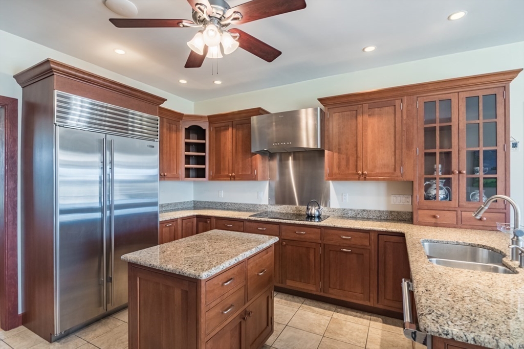 65 Bridge Street Hatfield, MA 01038 - Photo 14 of 40 a kitchen with kitchen island granite countertop a sink stainless steel appliances and cabinets