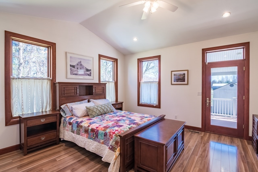 65 Bridge Street Hatfield, MA 01038 - Photo 18 of 40 a bedroom with a bed and a window