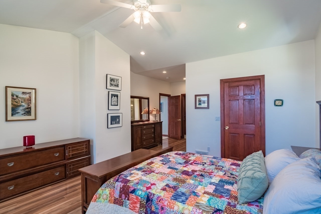 65 Bridge Street Hatfield, MA 01038 - Photo 19 of 40 a bedroom with a bed and a dresser