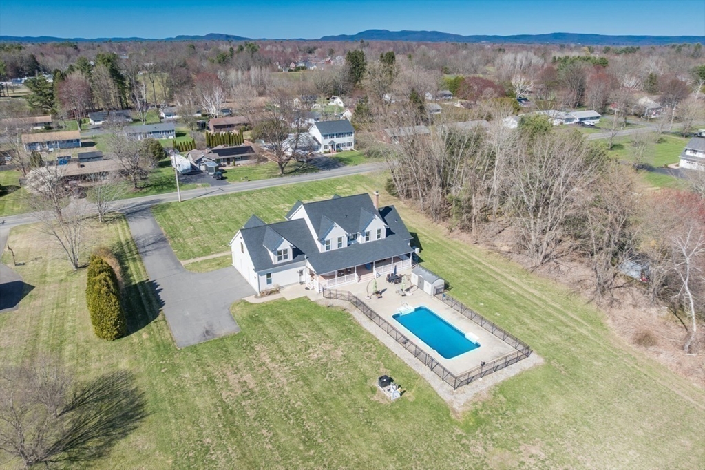65 Bridge Street Hatfield, MA 01038 - Photo 31 of 40 a view of a city with mountains in the background