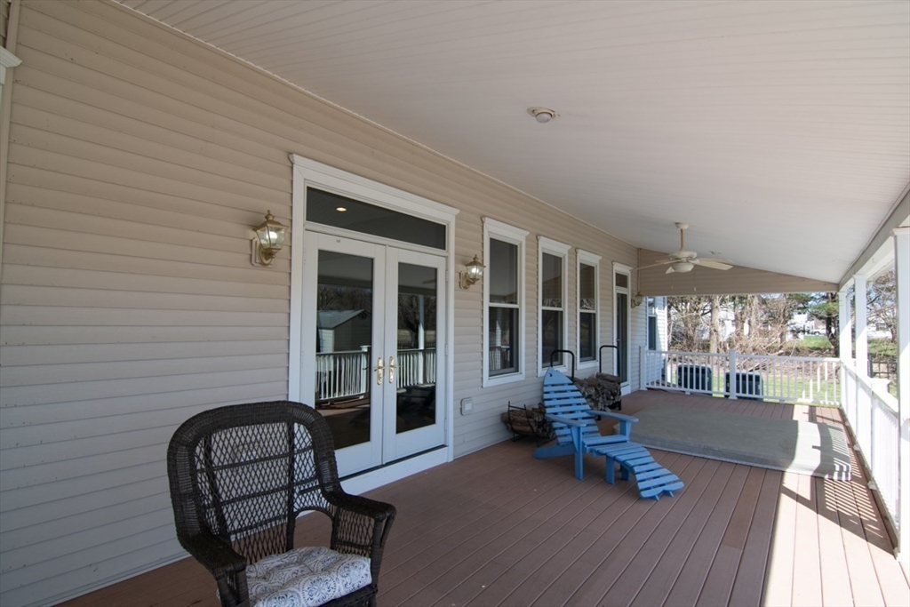 65 Bridge Street Hatfield, MA 01038 - Photo 32 of 40 a living room with furniture and large windows