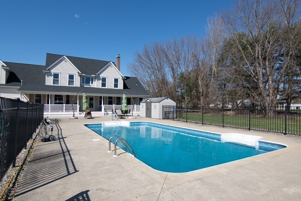 65 Bridge Street Hatfield, MA 01038 - Photo 34 of 40 a view of a house with swimming pool