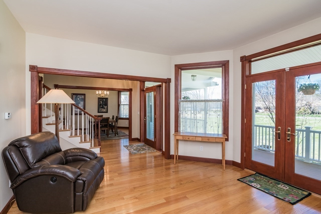 65 Bridge Street Hatfield, MA 01038 - Photo 10 of 40 a living room with furniture and a window