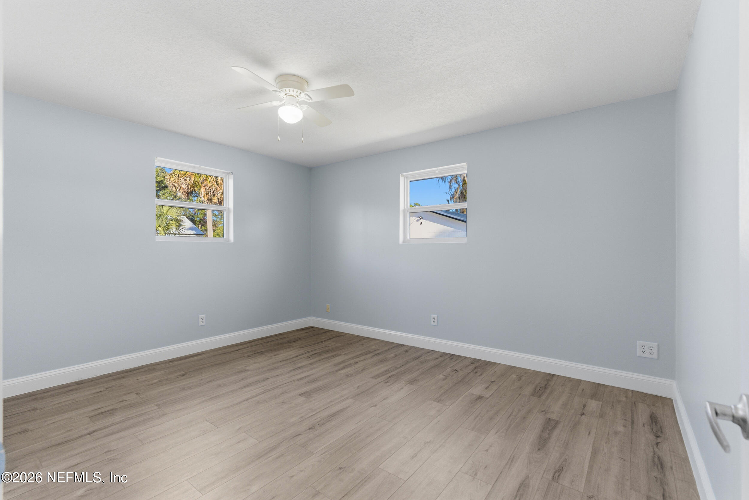 97150 Caravel Trail Yulee, FL 32097 - Photo 26 of 35 a view of room with window and ceiling fan