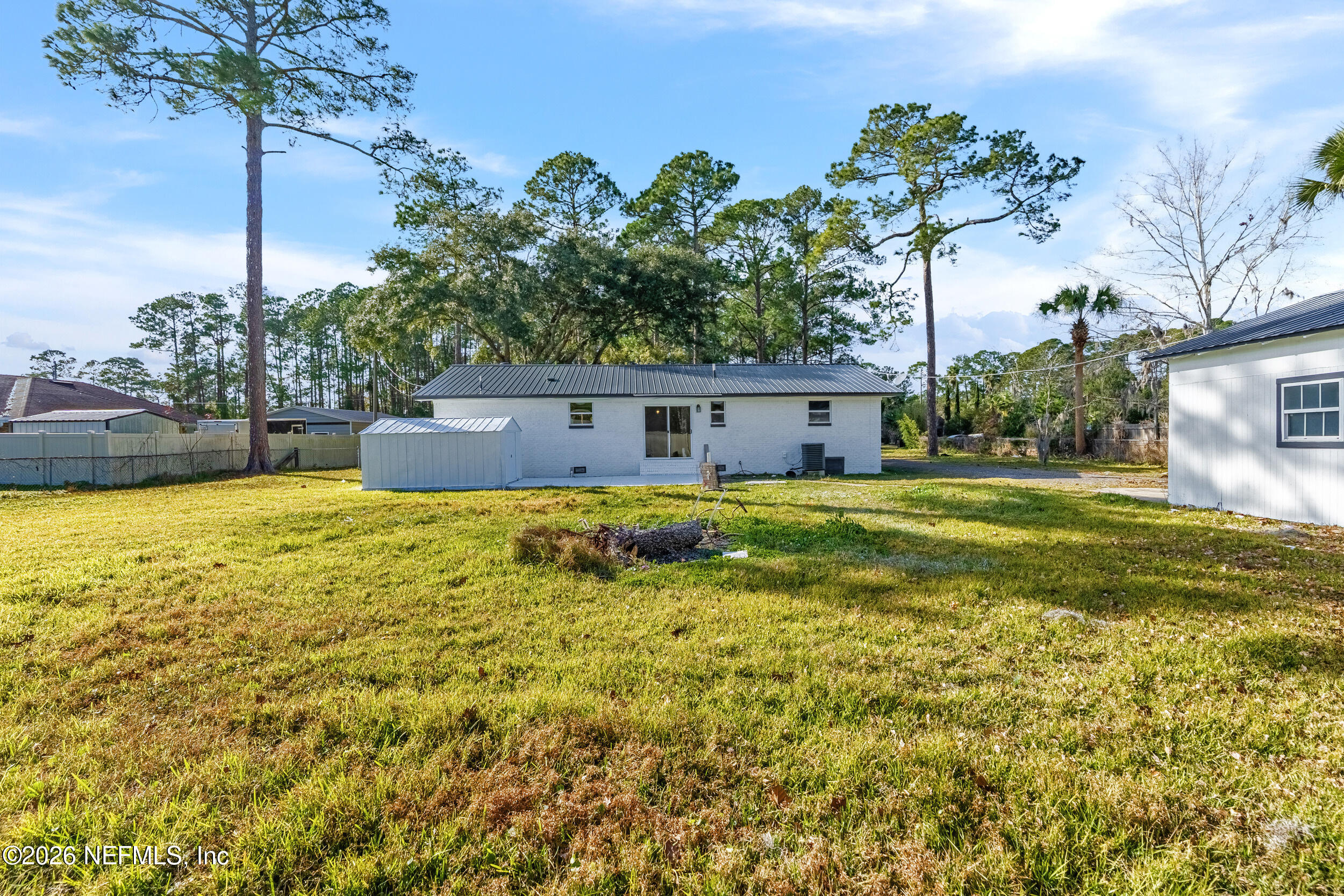 97150 Caravel Trail Yulee, FL 32097 - Photo 32 of 35 a house view with a swimming pool