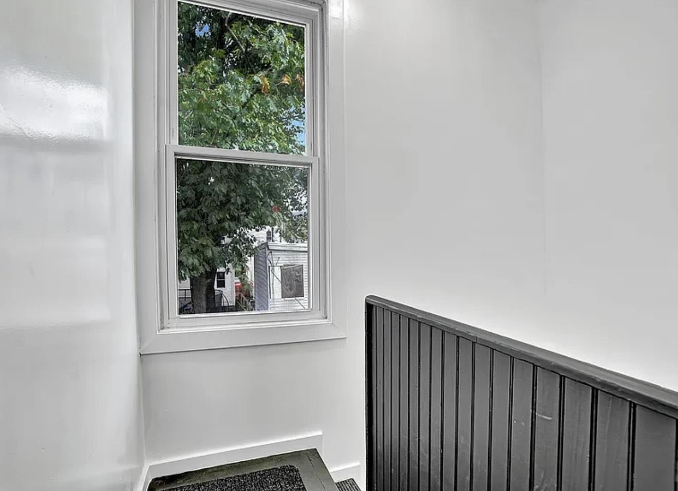 49 Tichenor Terrace, Unit 2 Irvington, NJ 07111 - Photo 7 of 9 a view of a small space with a window