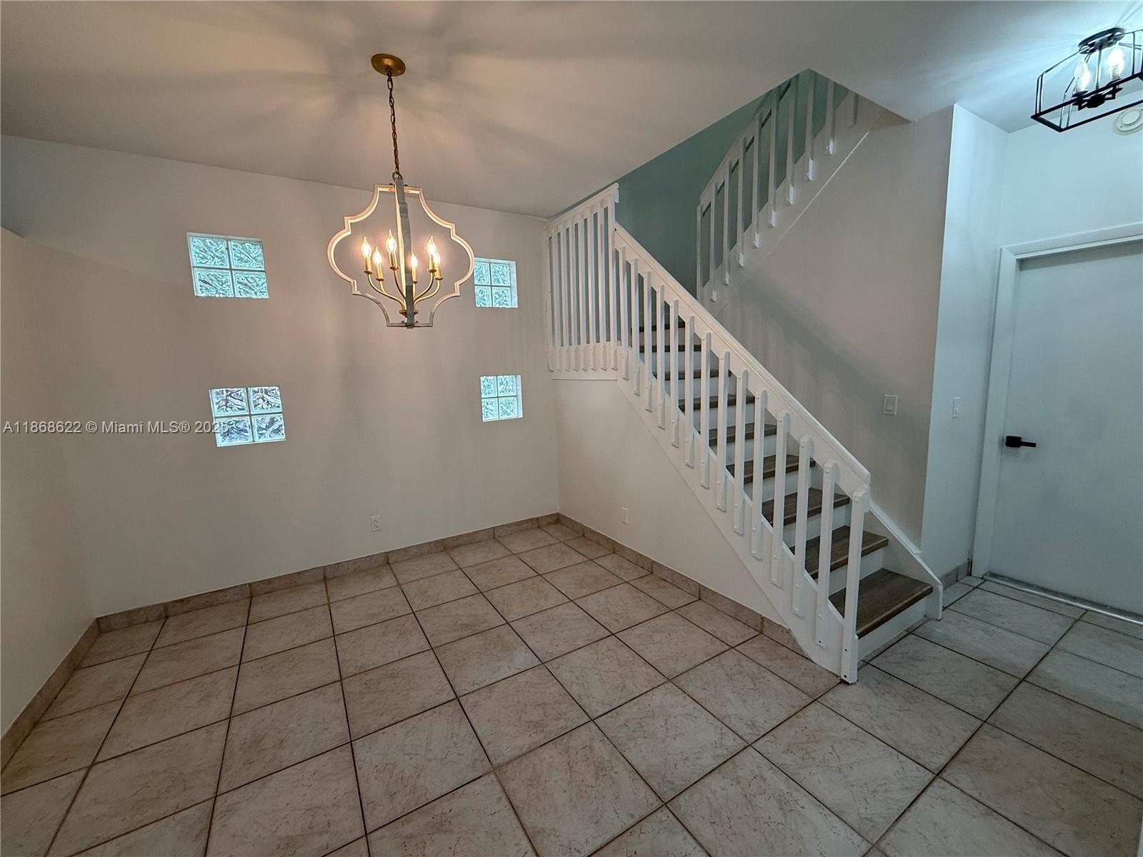 6955 Southwest 148 Lane Davie, FL 33331 - Photo 5 of 22 a view of an entryway with a window
