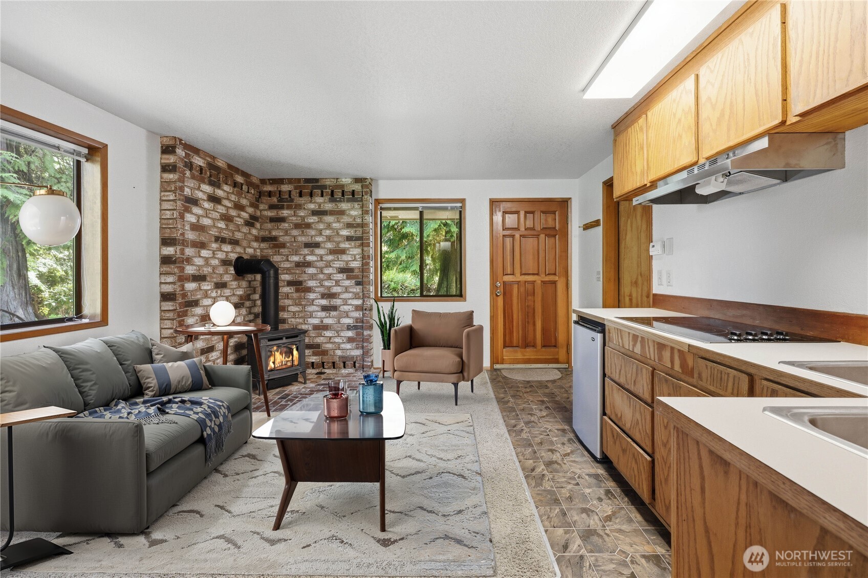252 Jansen Road Nordland, WA 98358 - Photo 35 of 40 a living room with furniture and a fireplace