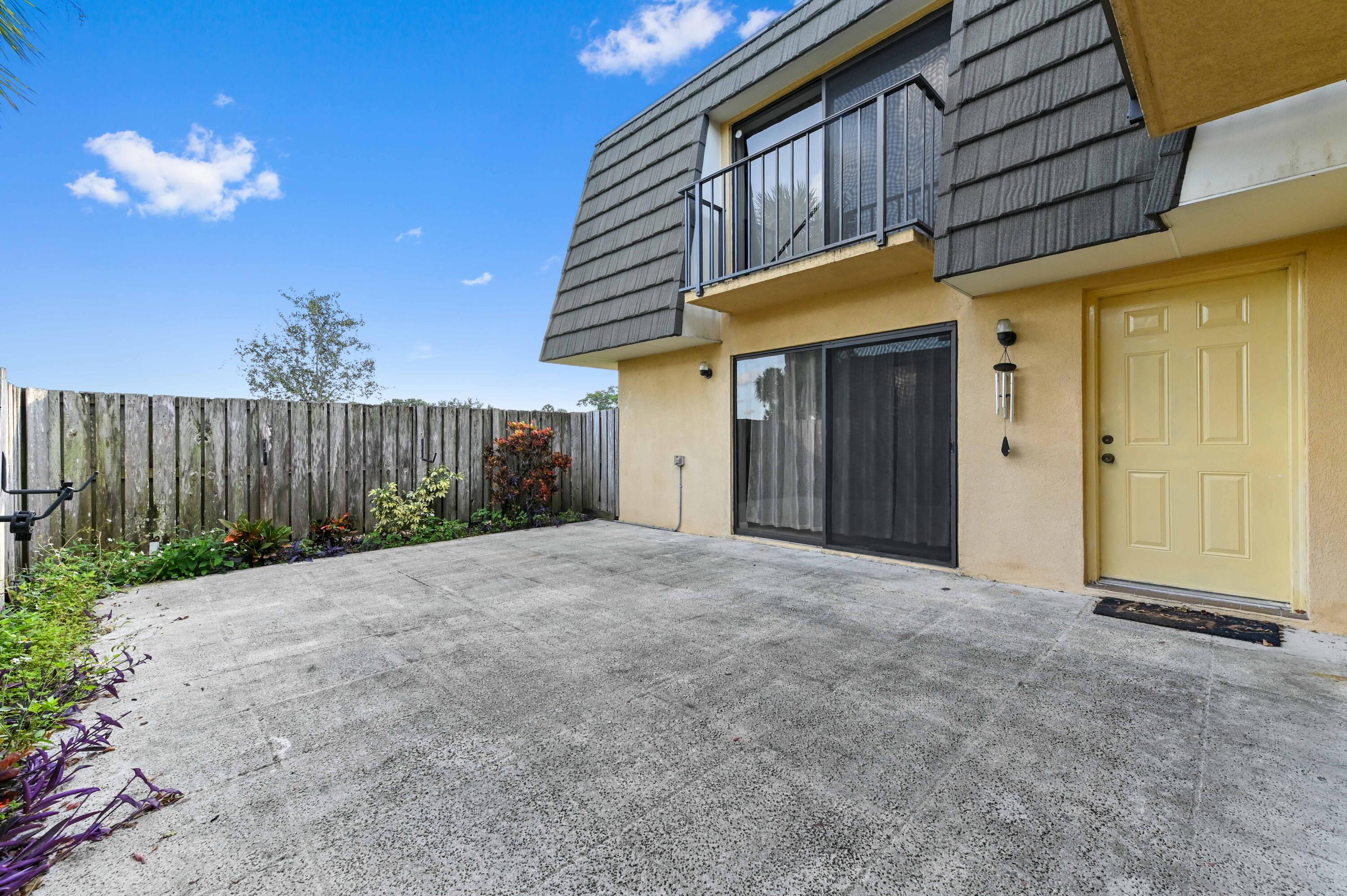 619 6th Way West Palm Beach, FL 33407 - Photo 1 of 24 a view of a porch with a backyard