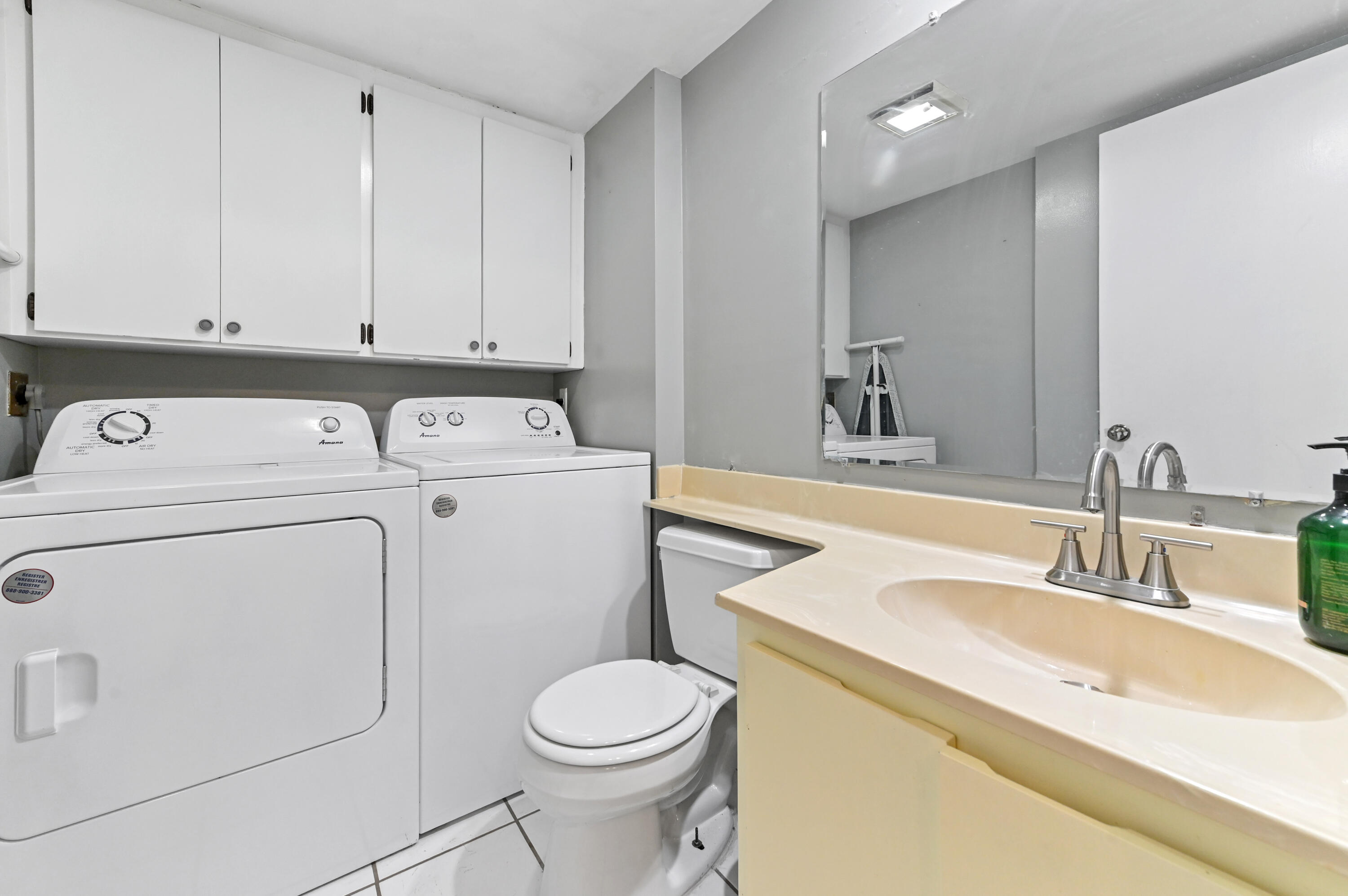 619 6th Way West Palm Beach, FL 33407 - Photo 11 of 24 a bathroom with a sink toilet and vanity