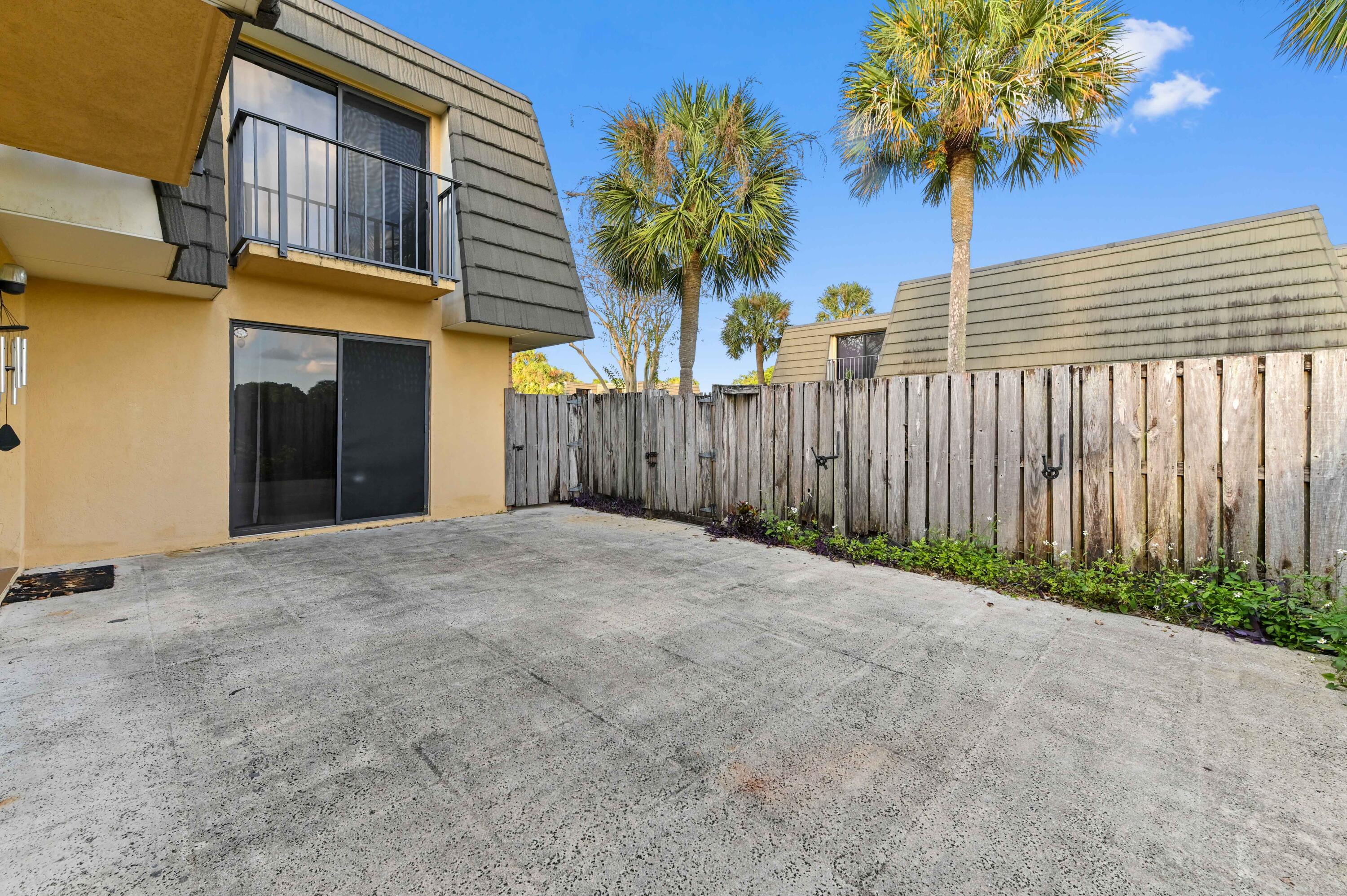619 6th Way West Palm Beach, FL 33407 - Photo 24 of 24 a view of a house with a yard and garage