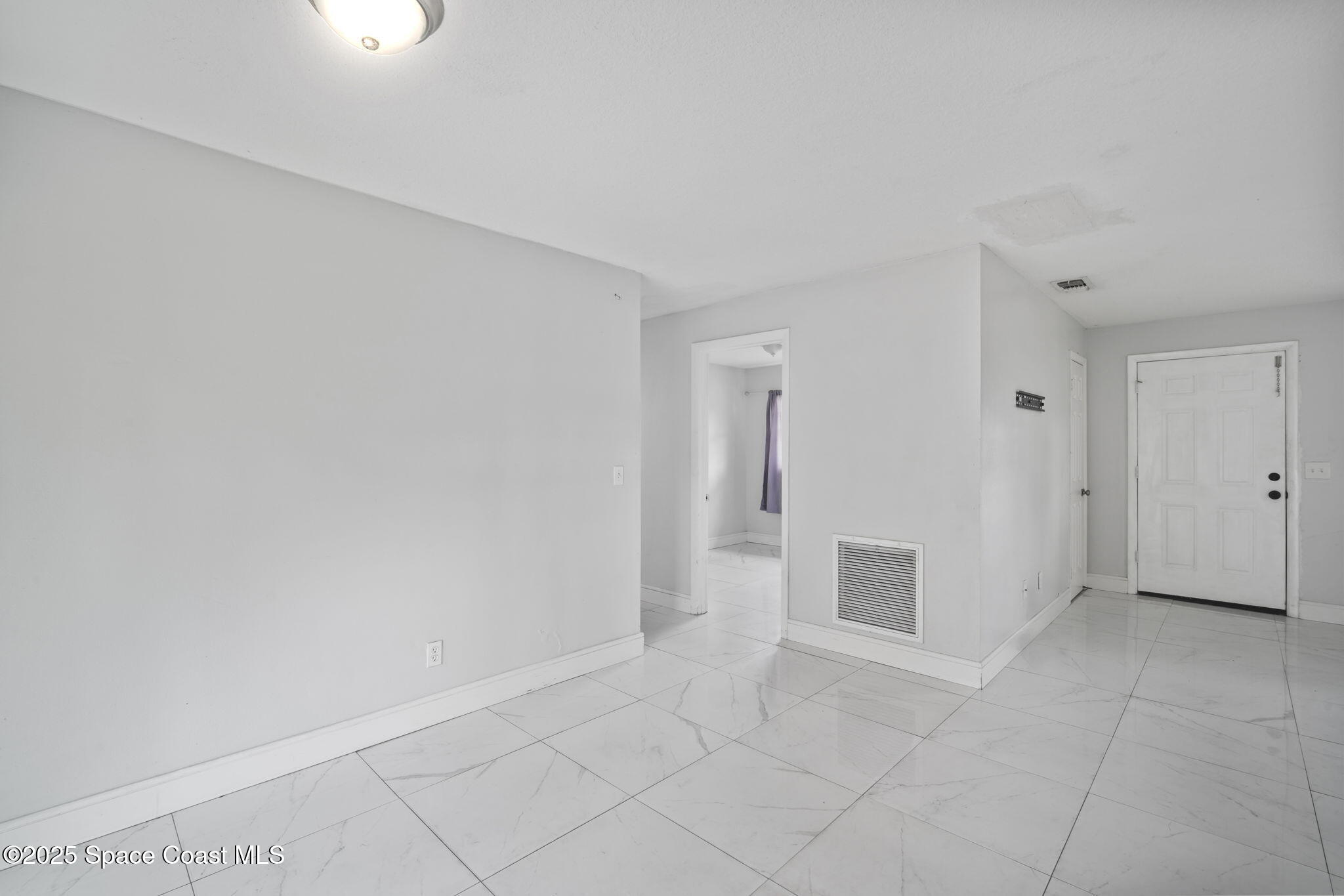 93 Prospect Avenue Cocoa, FL 32922 - Photo 11 of 25 a view of an empty room