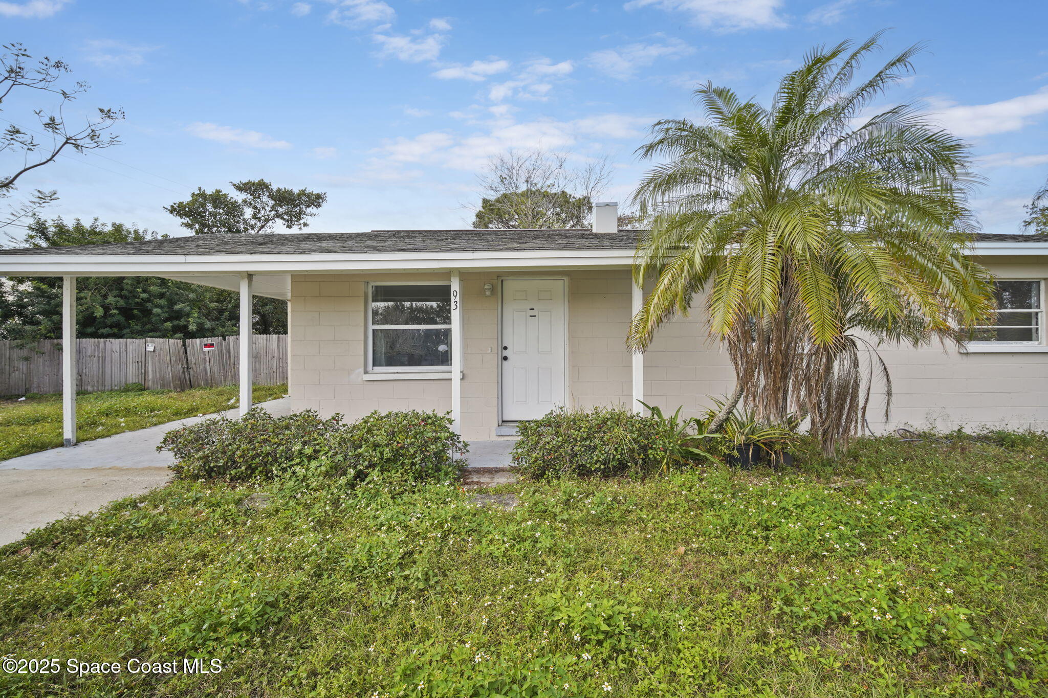 93 Prospect Avenue Cocoa, FL 32922 - Photo 3 of 25 front view of a house with a yard