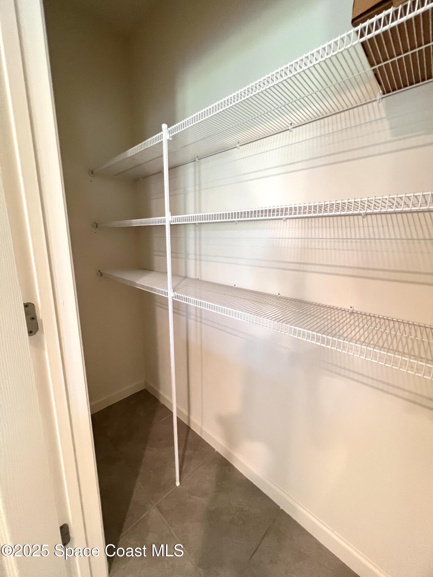 4631 Talbot Boulevard Cocoa, FL 32926 - Photo 14 of 24 a view of a closet