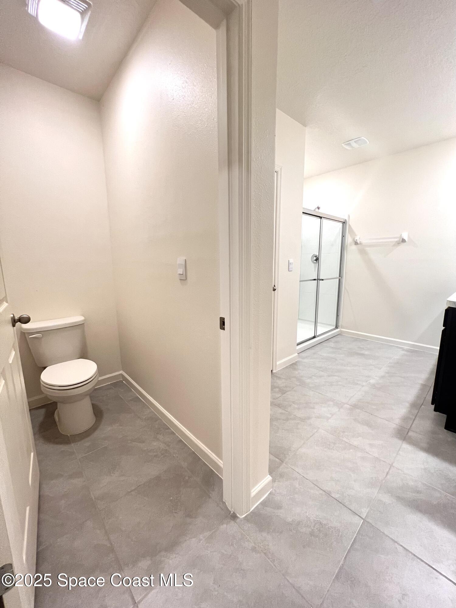 4631 Talbot Boulevard Cocoa, FL 32926 - Photo 18 of 24 a bathroom with a toilet