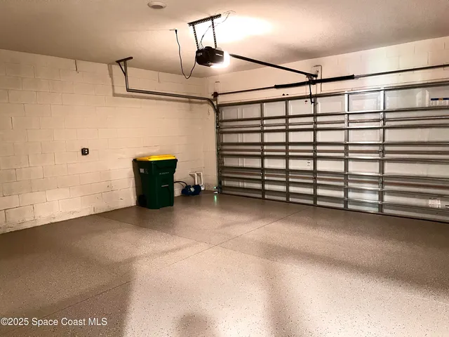 a view of a house with pool and a yard