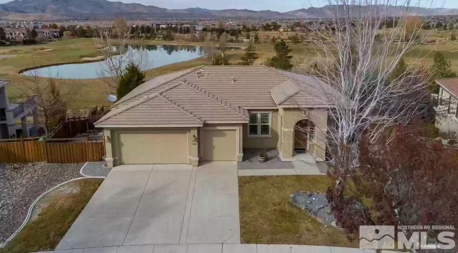 2820 Oxley Drive Sparks, NV 89436 - Photo 2 of 10 a view of a house with a yard