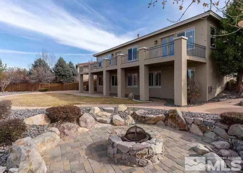 2820 Oxley Drive Sparks, NV 89436 - Photo 4 of 10 a front view of a house with a yard