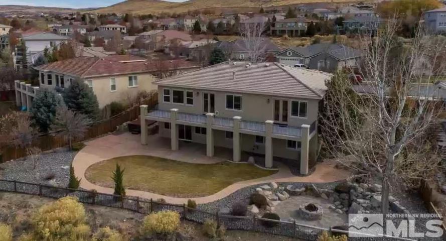 2820 Oxley Drive Sparks, NV 89436 - Photo 5 of 10 an aerial view of a house with swimming pool and mountain view