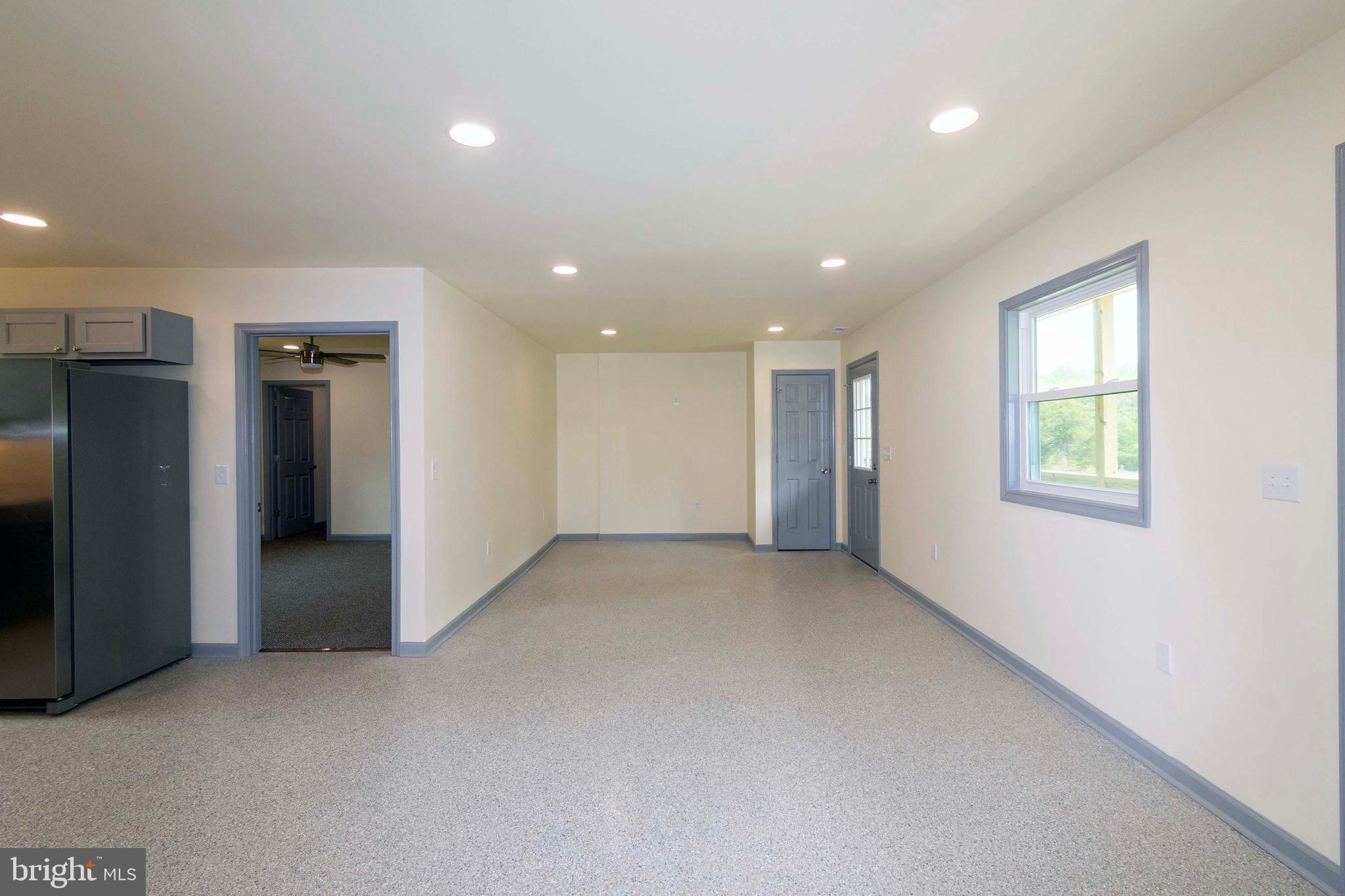 20738 Monrovia Road Orange, VA 22960 - Photo 23 of 50 an empty room with a natural light