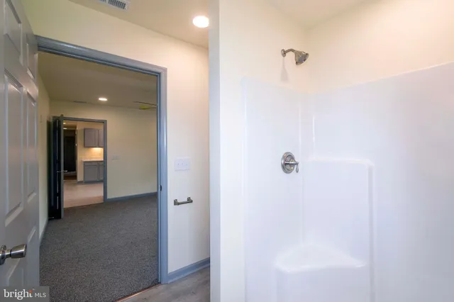 a view of an empty walk in closet