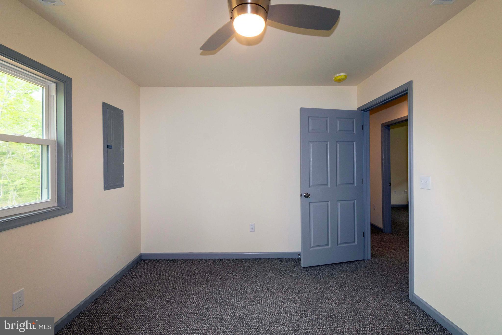 20738 Monrovia Road Orange, VA 22960 - Photo 39 of 50 an empty room with windows and closet