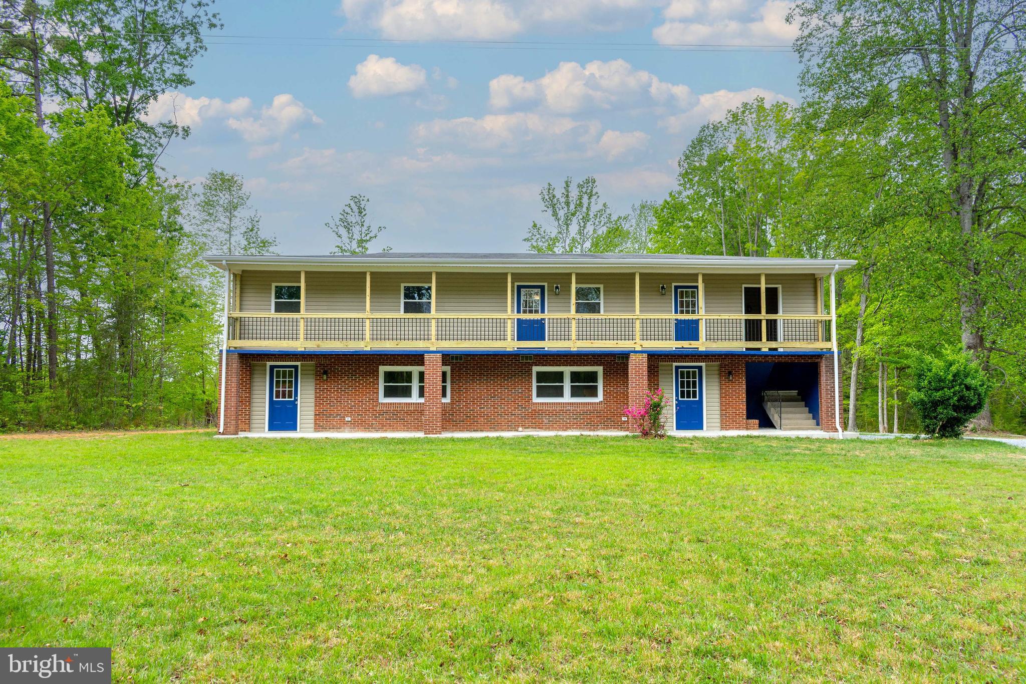 20738 Monrovia Road Orange, VA 22960 - Photo 6 of 50 a view of a house with a yard and potted plants