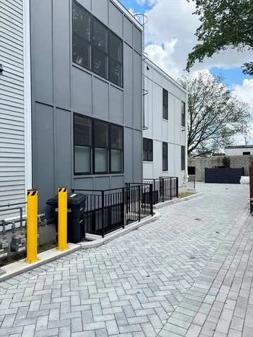 a view of a building with a street