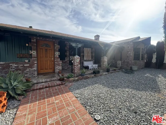 a view of a house with sitting area