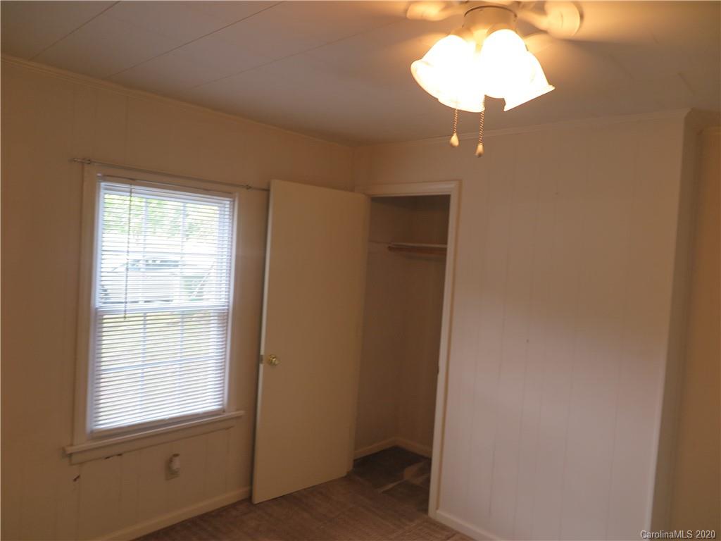 515 Upper Spencer Mountain Road Stanley, NC 28164 - Photo 14 of 28 a view of an empty room with a window