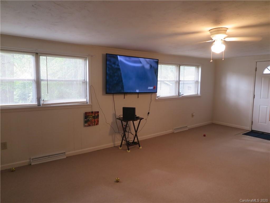 515 Upper Spencer Mountain Road Stanley, NC 28164 - Photo 21 of 28 wooden floor and window in a room