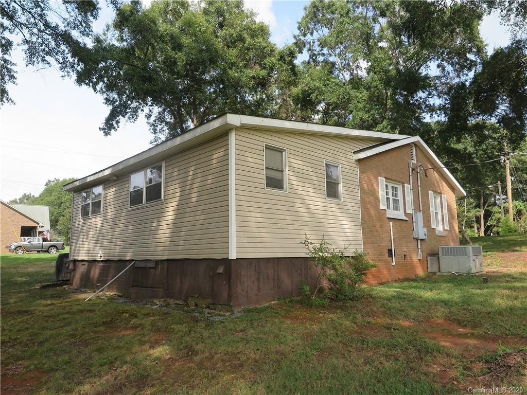 515 Upper Spencer Mountain Road Stanley, NC 28164 - Photo 10 of 28 a front view of a house with a yard